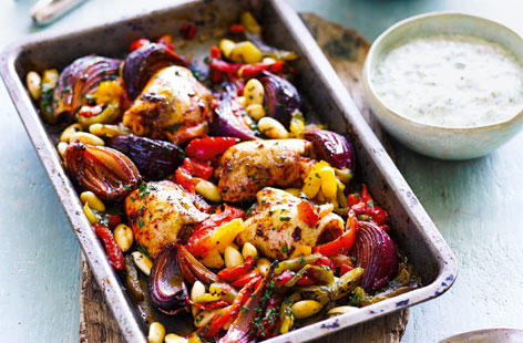 This spicy harissa-baked chicken with Mediterranean couscous and the fresh taste of tzatziki makes a simple yet tasty meal for two