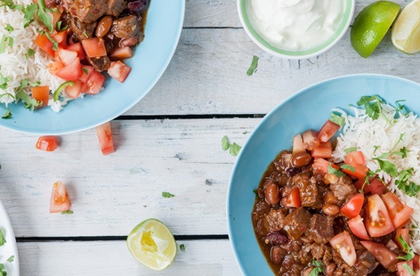 This rich, warming chilli from the Great British Chef contains a surprise ingredient: coffee. Using it makes the beef even more tender and adds even more depth of flavour. This is lovely served with rice and the chopped tomato and coriander.