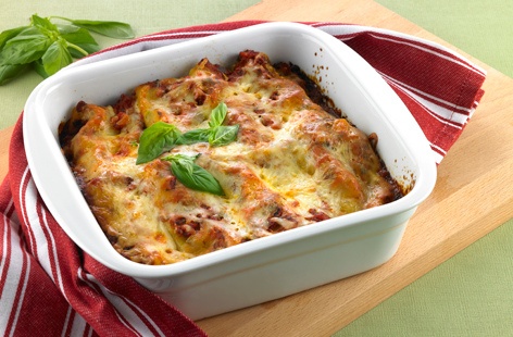 Bring a taste of Italy to the table with this delicious, warming dish of filled Cannelloni tubes enveloped in tomato and basil sauce and baked with a mozzarella topping 