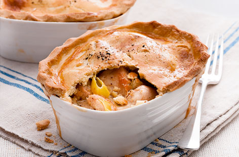 Recreate tasty pub-grub at home with these easy chicken and leek pot pies. To cook, leeks and the chicken are simmered in cream and mustard before being spooned into individual pie dishes, covered with shortcrust pastry and baked until golden. Serve with mash.