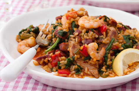 Add some spice to your paella with this take on the traditional Spanish dish, which is packed full of incredible flavours. Both pork and chorizo are used, along with tiger prawns. The spice comes from red chilli, although it's optional.