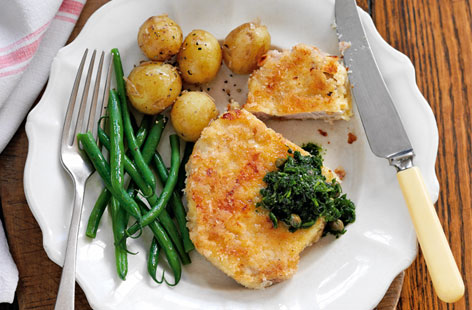 How do you make a pork steak even more delicious? Why, you crust it in parmesan, of course. This recipe for parmesan-crusted pork steaks takes just 10 minutes to prepare and an additional 10 to cook. Served with steamed new potatoes, it really couldn't be simpler.