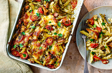 For an easy family dinner idea that's sure to satisfy, look no further than this colourful pesto pasta bake recipe with flaky pink salmon, tomatoes and mozzarella