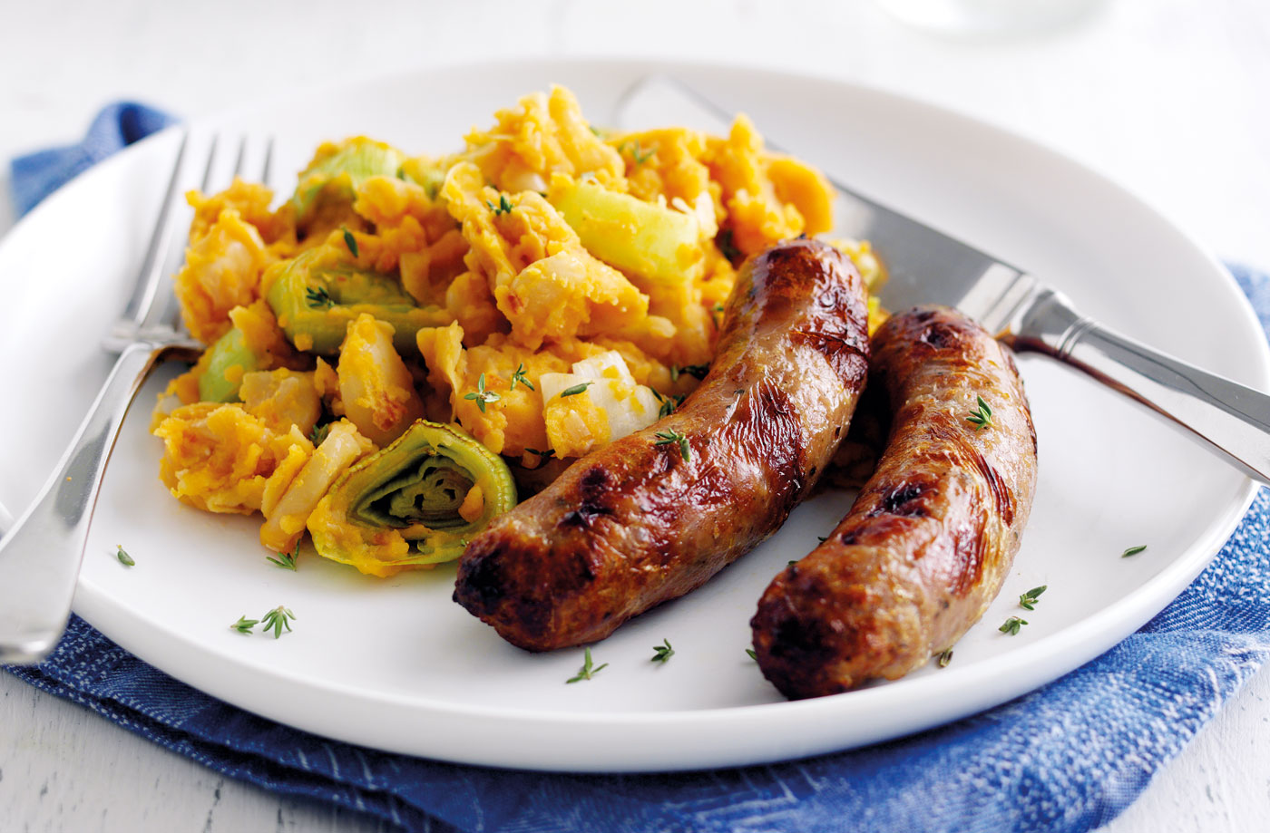 Sausages with tomato, leek and butter bean mash recipe
