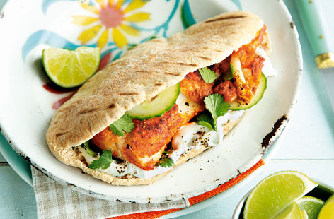Bursting full of vibrant tandoori spices and served with fresh, crunchy vegetables, these lightly spiced fish pittas make for a tasty outdoor summertime meal