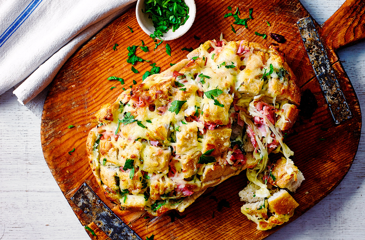Tear-and-share cheesy ham and garlic bread recipe
