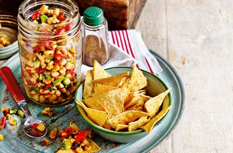 Make the most of summer with this tangy sweetcorn salsa, loaded with freshly chopped avocado and sweet cherry tomatoes