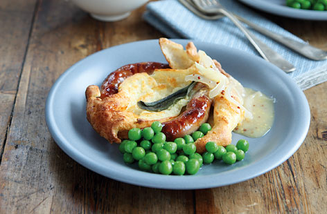 Make four individual toad-in-the-holes with this tasty recipe – mastering the Yorkshire pudding batter is easier than it seems. The autumnal flavours of the mustard and cider gravy is the perfect accompaniment.